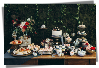 Moody wedding reception dessert sweets table